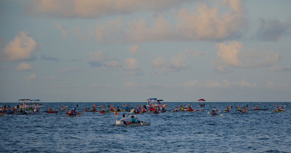 The kayakers: every swimmer must have a support vessel with them throughout the swim.  This is at the beginning of the race.  